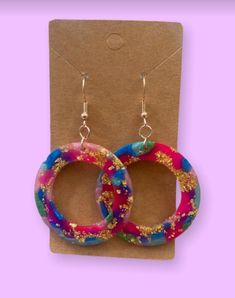 Handmade resin earrings by me! These are super light, so they won't hurt your ear. I had fun making them :) Multicolor Earrings, Glitter Earrings, Party Earrings, Earrings Hoop, Resin Earrings, Jewelry Earrings Hoops, Statement Earrings, Crochet Earrings, Etsy Earrings