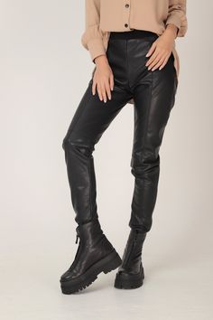 STRETCHY BLACK VEGAN LEATHER LEGGINGS IN SKINNY FIT GARMENT FEATURES: * Classic, timeless silhouette in a skinny leg fit * Soft elasticated waist in black ribbed stretch for super comfy dressing * Visible front decorative stitches for sublime high-end detail * Made from quality high stretch vegan leather * Comes unlined SIZING & FITTING: Model is 170cm tall and wears size S. This piece is available in sizes XS-XXL. NB: This product could be customized according to your measurements. Please l Black Leather Pants For Alternative Fashion In Fall, Fitted Leather Pants For Fall Alternative Fashion, Edgy Fitted Leather Leggings, Fitted Leather Edgy Leggings, Black Gothic Leather Pants For Streetwear, Edgy Leather Pants For Alternative Fashion In Fall, Edgy Leather Pants For Fall Alternative Fashion, Black Gothic Leather Pants For Fall, Black Gothic Leather Pants