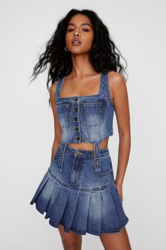 Hey, cute top. Feel luxe in this top, made from a high quality denim material with a corset detail, cropped length and button up fastening. This easy little number will have you rodeo ready in no time. Style with the matching pleated denim skirt, vintage western boots and simple accessories for a timless matching set your transitional closet can't go without. Denim Corset Detail Top High Quality Denim Material Corset Detail Button Fastening Model wears a size S (US size 6/UK size 10). Denim Pleated Mini Skirt, Transitional Closet, Long Sleeve Dresses Fall, Pleated Denim Skirt, Pleated Denim, Homecoming Outfits, Strapless Prom Dresses, Formal Wear Dresses, Denim Corset