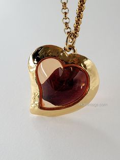 Authentic vintage Yves Saint Laurent Heart pendant with a rose petal inside. The chain provided with the pendant is not original. Created in the 1980s. Very good general condition. Signed "YSL". Dimensions: H - 5.0 cm, L - 4.0 cm. Free worldwide shipping with tracked parcel. Comes in a fabric pouch. Do not hesitate to contact me for any additional information (delivery method, request for additional photos, etc.). Yves Saint Laurent Necklace, Saint Laurent Vintage, Vintage Yves Saint Laurent, Fabric Pouch, Vintage Ysl, Vintage Heart, Mode Vintage, Rose Petals, Heart Pendant