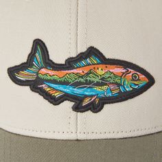 Hit the road or the nearest hike in our Trucker, the perfect companion for outdoor adventures near or far. 100% Cotton 8.26 oz. Structured front with firm mesh back Snapback with Life is Good® label on the back Six panel structured low-mid crown with six rows of stitching on the brim. Woven patch Imported | Life is Good Fish Mountain Scene Hard Mesh Back Cap in Bone Six-panel Baseball Cap With Logo Patch For Outdoors, Logo Patch Six-panel Baseball Cap For Outdoor, Outdoor Six-panel Snapback Hat With Logo Patch, Outdoor Six-panel Trucker Hat With Logo Patch, Outdoor Logo Patch Six-panel Snapback Hat, Trucker Hat With Logo Patch For Outdoor Activities, Flat Bill Baseball Cap With Logo Patch For Outdoor, Outdoor Trucker Hat With Logo Patch, Curved Bill Baseball Cap With Logo For Outdoor Activities