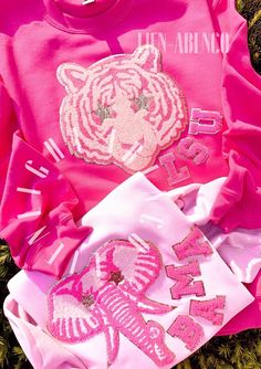 This listing is for the LETTERING option of our Preppy Pink Mascots™. You MUST enter your choice of MASCOT and the LETTERING you wish in the comment portion. Please select your size and color option. Preppy team sweatshirt, pink mascot patch sweatshirt, preppy game day mascot star sweatshirt, game day sweatshirt, chenille patch, cheerleading team gifts Hot Pink and Light Pink sweatshirts really make these Pink Preppy Mascots POP! - indicate EXACTLY what wording you would like in the comments. If Customizable Pink Tops For Game Day, Pink Pre-shrunk Cotton Sweatshirt, Sporty Pink Tops For Game Day, Customizable Sporty Pink Tops, Pink Long Sleeve Tops For Game Day, Long Sleeve Pink Top For College, Pink Crew Neck Top For Fans, Pink Cotton Game Day Top, Pink Long Sleeve Sweatshirt For Game Day