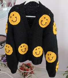 COLOR: black. (Desired color can be knitted upon order.) MODEL: emoji SIZE: xs. s. m. l. (size xl and kkl can be knitted upon order.) LENGTH: 542cm 55cm. (Desired length can be knitted upon order. AREA OF USE: daily use and gifts in all seasons CLOSURE: button can be added upon order WASHING INSTRUCTIONS: short program at low temperature  PACKAGING:. safe and durable packaging, gift wrap on request SHIPPING: On-time, trouble-free delivery with reliable cargo company This special cardigan has a d Handmade Cardigan, Yellow Yarn, Thick Cardigan, Outfit Styling, Packaging Gift, Cardigan Black, Womens Cardigan, Facial Expressions, Cool Sweaters