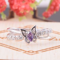 "White gold amethyst ring, Butterfly ring, 14k gold ring for her, Promise ring gold, Promise ring for her, Dainty ring gold,Marquise cut ring WE OFFER UNLIMITED PERIOD INSTALLMENTS PLAN This is a beautiful, stunning, feminine ring that works well for all occasions, styles, and ages. You will love it! Ring information: Main stone: Amethyst Approximate size: 4*2mm Accent stone: Cubic zirconia Metal type: Gold Metal stamp: 14k Gold Customization / Replacements It's easy to create jewelry that's per Lavender Cubic Zirconia Promise Ring, Lavender Cubic Zirconia Rings For Gift, Purple Topaz Ring For Promise, Purple Cubic Zirconia Promise Ring, Purple Diamond Promise Ring In Fine Jewelry Style, Purple Open Ring For Promise, Purple Open Ring Birthstone For Anniversary, Fine Jewelry Purple Topaz Ring As Gift, Purple Birthstone Open Ring For Anniversary