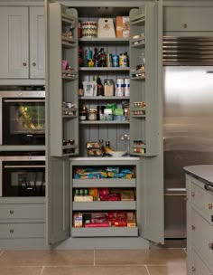 an open pantry in the middle of a kitchen