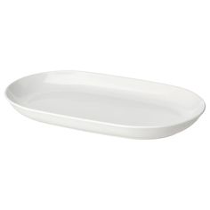 a white oval platter on a white background