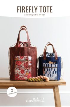 two bags sitting on top of a wooden table next to each other with the title, firefly tote