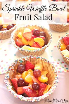 fruit salad in small bowls with sprinkles on the table