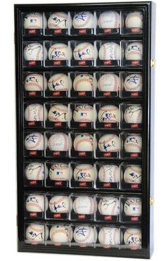 a display case filled with baseballs in it