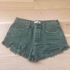 Such A Cute Army Green Pair Of Denim Shorts!! Nwot And Such A Good Staple To Have In Your Closet But In A Fun Color. Great Quality Too! Green Denim Jean Shorts With Pockets, Trendy Green Cutoff Shorts, Green Shorts With Frayed Hem, Trendy Green Denim Shorts, Green Jeans With Frayed Hem For Summer, Ripped Green Cotton Bottoms, Green Distressed Denim Bottoms, Trendy Green Cutoff Jean Shorts, Ripped Green Denim Bottoms