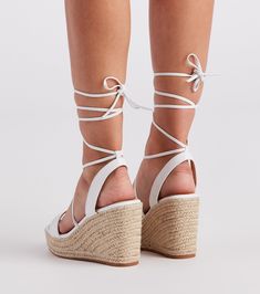 These espadrille wedges will put a spring in your step! They feature a faux leather square toe. wide toe strap. and lace-up ankle straps with a supportive ankle band. Complete the look with a trendy handbag.Fit & Features Square toe Wide toe strap Lace-up ankle strap with supportive band Espadrille sole Faux leather trim Wedge heel Lace-up Synthetic Heels For Summer, Chic Lace-up Wedge Heel Sandals For Spring, Adjustable Lace-up Platform Wedge Sandals, Spring Lace-up Heels, White Heeled Sandals With Laces For Spring, Adjustable Platform Lace-up Sandals, Lace-up Wedge Sandals For Spring, Spring Lace-up Sandals With Heel Loop, White Heels With Laces For Spring