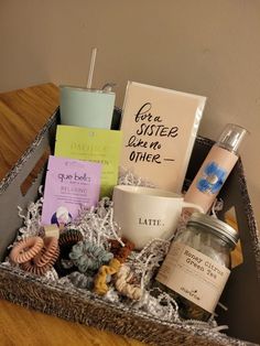 a basket filled with items sitting on top of a wooden table