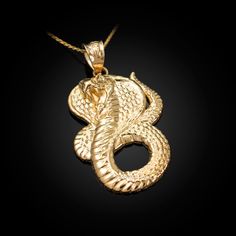 Yellow Gold Charging King Cobra Snake Pendant Necklace Metal Purity: 10k and 14k Metal Color: Yellow Gold, White Gold and Rose Gold Available as pendant or necklace. Available in 16", 18", 20", 22" chain length Pendant weight: 2.50 grams (10k) | 2.70 grams (14k). Pendant height (w/ bail): 1.28 inches Pendant width: 0.73 inches Bail opening: 3.00 mm Finish: High Polished Gold Snake-shaped Engraved Necklace, Gold Snake Necklace With Engraving, Gold Engraved Snake Necklace, Engraved Snake-shaped Yellow Gold Jewelry, Engraved Yellow Gold Snake Jewelry, Gold Snake-shaped 14k Gold Necklace, Gold Snake Shape 14k Gold Necklace, Snake-shaped Yellow Gold Jewelry For Anniversary, 14k Yellow Gold Snake-shaped Jewelry