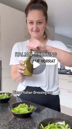 a woman is making salad in her kitchen with the words italian dressing off vorrat