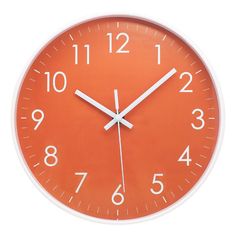 an orange clock with white hands and numbers on the face is shown against a white background