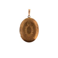 A vintage gold tone oval locket pendant. The gold plating shows quite a bit of wear but it gives it a great vintage look. Including the bail, the piece is a little over 1.5 inches long. Gold Locket Necklace With Vintage Charm, Gold Pendant Locket Necklace With Vintage Charm, Gold Victorian Oval Locket Necklace, Classic Gold Oval Locket Necklace, Classic Gold Pendant Locket Necklace, Gold Heirloom Locket Necklace With Antique Finish, Heirloom Gold Locket Necklace With Antique Finish, Gold Oval Heirloom Locket Necklace, Classic Gold Locket Necklace With Oval Pendant