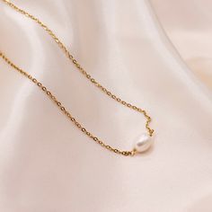 Minimalist pearl necklace with dainty gold plated chain. Stainless Steel Pearl Chain Necklace For Gift, Minimalist Gold Plated Pearl Necklace As Gift, Minimalist Pearl Chain Necklace As Gift, Minimalist Gold-plated Pearl Necklace As A Gift, Gift Minimalist Pearl Chain Necklace, Minimalist Gold Plated Pearl Necklace With Adjustable Chain, Minimalist Gold-plated Pearl Necklace With Adjustable Chain, Necklace Necklace, Natural Elements