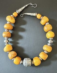 Yemenite globe with African copal Amber & silver Bicone Beads Moroccan Necklace.  | eBay Moroccan Necklace, African Inspired Jewelry, Moroccan Tea, Amber Bead Necklace, Artisan Jewelry Necklaces, Beaded Jewelry Designs, Handcrafted Artisan Jewelry, Ancient Jewelry, Gemstone Jewelry Handmade