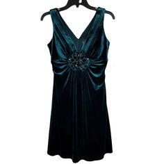 Nwt Size 4 Dark Teal Sleeveless V-Neck Dress. Dress Has Pleating And Beading In The Center. Back Zipper Along With Pleating. Great For Special Occasions. Measurements Are Taken While Laying Flat And Are Approximate: Armpit To Armpit 15 1/2" Length 36" Velvet V-neck Dress For Night Out, Velvet V-neck Mini Dress For Cocktail, Velvet V-neck Cocktail Mini Dress, V-neck Velvet Dress, Formal Velvet V-neck Mini Dress, Cocktail Velvet V-neck Mini Dress, Holiday Velvet V-neck Evening Dress, Holiday Evening Velvet V-neck Dress, Fitted Sleeveless Velvet Dress