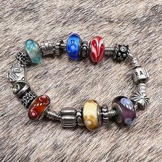 https://jewelrysalehub.com/ I don't know much about Pandora, but will do my best to describe this as well as I can. All are sterling and many with semi-precious stones as well. Includes 19 charms/beads including Great opportunity to get a pristine bracelet and charms. Luxury Multicolor Polished Beads Jewelry, Silver Beaded Bracelet Jewelry, Multicolor Sterling Silver Beaded Bracelets, Luxury Adjustable Multicolor Jewelry, Luxury Adjustable Bracelet With Silver Beads, Luxury Adjustable Bracelets With Silver Beads, Luxury Multicolor Sterling Silver Bracelets, Multicolor Metal Spacer Beads Jewelry, Multicolor Polished Bead Bracelet