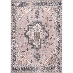 an antique style rug in pink and blue tones