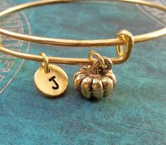 Pumpkin Bangle Bracelet Pumpkin Bracelet Pumpkin Jewelry Halloween Stackable Bangle Pumpkin Charm Br Halloween Charm Bracelet Gift, Halloween Bracelet Jewelry Gift, Adjustable Gold Jewelry For Halloween, Adjustable Metal Name Bracelet With Charms, Bangle Pumpkin, Adjustable Gold Bracelets For Halloween, Handmade Jewelry For Fall Gift, Handmade Adjustable Jewelry For Fall, Adjustable Name Bracelet With Charms