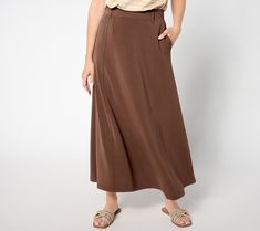 Just what your wardrobe needs -- a stylish-yet-practical midi-length skirt (with pockets!). An encased elastic waistband ensures comfort and princess seams add visual appeal while flattering your figure. From Peace Love World. Elastic Waistband Full Maxi Skirt For Work, Workwear Maxi Full Skirt With Elastic Waistband, Workwear Full Maxi Skirt With Elastic Waistband, Workwear Maxi Skirt With Elastic Waistband, Maxi Full Skirt With Elastic Waistband For Work, Stretch Full Maxi Skirt For Workwear, Versatile Skirt With Side Pockets For Work, Versatile Workwear Skirt With Side Pockets, Modest Skirt For Workwear