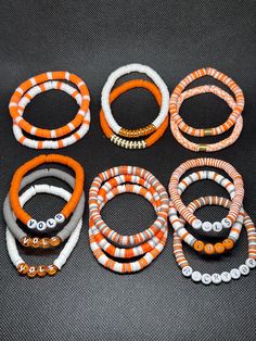 TN Vols game day accessories! Stack options can be any bracelet or bracelets you wish in the quantity you order.  colors may vary amongst different screens Cheap Sporty Stretch Bracelet For Game Day, Tennessee Clay Bead Bracelets, Aesthetic Fall Bracelet Ideas, Tennessee Vols Bracelet, Preppy Fall Clay Bead Bracelets, Fall Clay Beaded Bracelets, Tennessee Crafts Diy, Fall Braclets Clay Bead, Bracelets Inspo Clay Beads