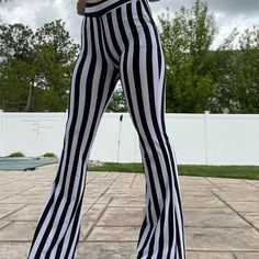 The Perfect Gift for Valentine's Day, Christmas, Birthday, Wedding, and Anniversary! The perfect outfit for renaissance fairs, nightlife, Halloween parties, raves, concerts, and more. Light and comfortable for all-day use! Express your style or be the life of the party with one of our White Striped High Waist Flare Trouser Pants. These Flare Trousers Pants are made of polyester. Complete the look with fashionable accessories such as a belt, purse, cuffs, top sleeve, etc. (not included). Package Includes 1 * White Striped High Waist Flare Trouser Pants US orders - Delivery in 12-15 business days once shipped. Ships worldwide. Allow 2-3 weeks for international shipping. Trendy Black Pants For Cosplay, Gothic Pants For Fall Party, Gothic Wide Leg Pants For Spring, Spring Gothic Wide Leg Pants, Gothic Party Bottoms For Fall, Gothic Fall Party Bottoms, Spring Rave Bottoms For Night Out, Rave Bottoms For Spring Night Out, Rave Style Bottoms For Spring Night Out