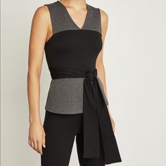 You'll Love The Understated Style Of This Two-Tone, Sleeveless Top In Luxe Ponte. The Waist-Cinching Ties Add A Hint Of Samurai-Chic To Its Minimalist Design. How To Wear: Wrap Across Back And Tie To The Front Wrap Across Front And Tie To The Back Chic Gray Evening Tops, Leather Tank Top, Wrap Tank Top, Silk Chemise, How To Wrap, Strappy Tank Tops, Silk Tank Top, V Neck Tank Top, Flowy Tank Tops