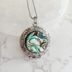 Abalone Shell Locket Necklace with photos, silver embossed picture locket, bridesmaid gift, personalized locket Elegant Birthstone Medallion Locket Necklace, Elegant Birthstone Locket Necklace Gift, Elegant Round Pendant Locket Necklace As Gift For Her, Personalized Medallion Jewelry For Her, Personalized Medallion Jewelry Gift For Her, Spiritual Nickel-free Round Disc Jewelry, Spiritual Engraved Jewelry For Her, Elegant Round Pendant Locket Necklace With Birth Flower, Spiritual Engraved Jewelry Gift For Her