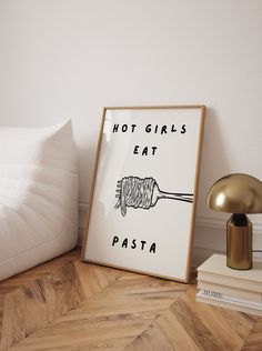 Introducing the "Hot Girls Eat Pasta Print"--an aesthetic and retro-inspired kitchen decor piece featuring an illustration of a fork with pasta wrapped around it, accompanied by the text "Hot Girls Eat Pasta." This high-quality art print is perfect for adding a touch of charm and personality to your kitchen wall decor. Ideal for food enthusiasts, retro decor lovers, and those who enjoy fun and stylish kitchen art, this print serves as a delightful reminder of the joys of pasta and adds a playful visual element to any kitchen. Whether you display it in your own kitchen or gift it to a friend, this print is sure to bring warmth and smiles to any space. Crafted with meticulous attention to detail, the vibrant colors and high-resolution quality ensure that the whimsical design is beautifully r Cute Kitchen Decor Themes, Vegan Kitchen Decor, Kitchen Pictures Decor Wall Art, Trendy Kitchen Decor, Retro Dinner, Aesthetic Kitchen Decor, Fun Kitchen Decor, Kitchen Decor Retro, Whimsical Kitchen