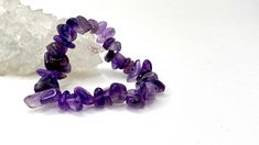 Amethyst Chips Bracelet You will receive 1 (ONE) Amethyst Chips Bracelet similar to the item in the picture Great for mixing and matching with other regular bracelets. . Amethyst has healing powers to help with physical ailments, emotional issues, and in Energy Healing and Chakra balancing. Amethyst crystal therapies are primarily associated with physical ailments of the nervous system, the curing of nightmares and insomnia, and balancing the crown chakra. FOLLOW US ON INSTAGRAM @earthsmineralsi Purple Crystal Bracelet For Gift, Purple Spiritual Crystal Bracelet With Stones, Adjustable Purple Crystal Bracelet With Stones, Spiritual Purple Crystal Bracelet With Stones, Adjustable Purple Crystal Bracelet, Crystal Chips, Crystal Therapy, The Nervous System, Chakra Balancing