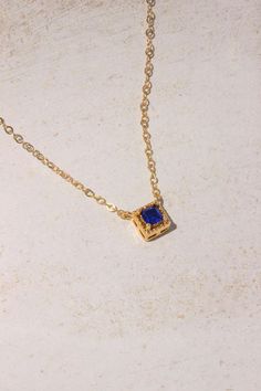 PRODUCT DESCRIPTION Chic and sophisticated, this Diane Necklace is inspired by the glamour of bygone eras. This opulent piece is crafted in 18k Gold-plated or 14k Gold-filled with metal and features a blue square-cut cubic zirconia pendant. Effortlessly elegant and pairs beautifully with day and evening ensembles. You are fine to shower in our gold-filled jewelry. Get it wet, wear it for life! A Dainty yet Elegant Necklace Water and Tarnish Resistant 14k Gold-filled with jeweler's brass (at leas Blue Tarnish-resistant Jewelry For Anniversary, Fine Jewelry Gold-plated Square Pendant, Fine Jewelry Gold Plated Square Pendant, Gold Necklaces With Rectangular Stone For Formal Occasions, Gold Jewelry With Rectangular Stone For Formal Occasions, Gold Jewelry With Rectangular Stone For Formal Events, Elegant Gold Plated Square Jewelry, Formal Gold Jewelry With Rectangular Stone, 14k Gold Jewelry With Blue Rectangular Stone