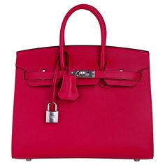 Mightychic offers an Hermes Birkin Sellier 25 bag featured in vibrant Framboise. Hermes Framboise is a rich, saturated raspberry pink which is gorgeous for year round wear. This limited edition bag is now retired and is sure to become a collectors treasure. Fresh with Palladium hardware. Stunning Veau Madame leather. This exquisite bag is modern and minimalist. A sleek pared down version that exudes chic sophistication. The leather grain is fine and luxe, and the signature sellier edges create a Elegant Red Bags With Lock, Luxury Red Bag With Lock, Elegant Pink Bag With Lock, Luxury Pink Bags With Lock, Luxury Pink Bag With Lock, Red Top Handle Bag With Lock, Tote Bag With Lock For Shopping, High-end Shopping Bags With Lock, Hermes Birkin Sellier