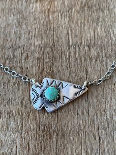 This dainty little arrowhead is the perfect addition to your southwestern style! It is so cute layered with other necklaces or on its own!  It has a 5mm turquoise dot in the center and has southern style stamping surrounding the stone.  **No turquoise stone is the same so colors will vary** Western Turquoise Necklace, Country Jewelry Necklaces, Tourqouis Jewelry, Punchy Jewelry, Real Turquoise Jewelry, Western Fashion Jewelry, Southern Jewelry, Rodeo Jewelry, Silver Smithing