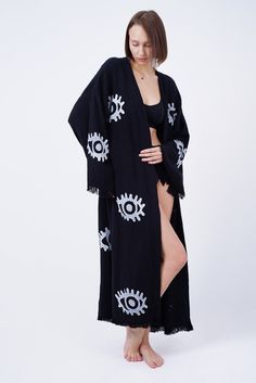 Introducing our exquisite organic cotton Handmade Evil Eye Boho Festival Kimono, a mesmerizing blend of bohemian elegance and spiritual symbolism. Handcrafted with love and care, this kimono is a stunning addition to your festival wardrobe, offering both style and positive energy. Our bohemian kimono, which is made of 100% handmade high quality cotton fabric, can be used as a pareo in daily life or on the beach. (Made in Turkey) All of our ultra soft products are OEKO-TEX Standard 100 Certified. Make sure to wash our eco-friendly kimono, which is 100% handmade, once before using it. You can machine or hand wash it delicately and please do not use bleach or fabric softener. When you wear the quick-drying kimono, you can feel its soft texture on your skin. The kimono, which contains Anatolia Black Cotton Summer Cardigan, Bohemian Cotton Cover-up, Black Long Cardigan For Beach, Traditional Oversized Kimono For Festival, Oversized Traditional Kimono For Festivals, Long Embroidered Cotton Kimono, Bohemian Oversized Cardigan For Vacation, Oversized Bohemian Cardigan For Vacation, Folk Style Summer Beach Kimono