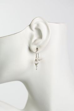 A beautiful gift for those born in April, featuring their birthstone of stunning quartz that is hand wrapped in sterling silver wire. These feminine earrings dangle from sterling silver earwires. Sterling Silver (lead and nickel free) Quartz .75", on sterling silver earwires We hand select our natural materials, thus there may be slight variations in color and/or size that will not detract from the overall aesthetic Our unique handcrafted designer jewelry for women is made in America, with each Adjustable Hypoallergenic Sterling Silver Wrap Earrings, Sterling Silver Wire Wrapped Long Drop Jewelry, Wire Wrapped Long Drop Sterling Silver Jewelry, Delicate Silver Linear Earrings With Ear Wire, Nickel-free Long Drop Sterling Silver Earrings, Hypoallergenic Sterling Silver Long Drop Linear Earrings, Hypoallergenic Sterling Silver Dangle Linear Earrings, Clear Round Sterling Silver Earrings, Silver Hypoallergenic Wrap Earrings For Gift