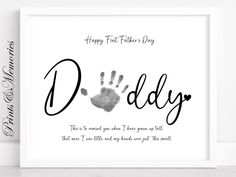 a father's day card with the words daddy and handprints on it