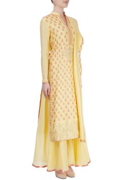 Yellow kurta with floral embroidered motifs and badla work. Paired with palazzo and scallop dupatta.
Component: 3
Embroidered
Neckline: Mandarin
Sleeve Length: Full
Fabric: Chanderi
Color: Yellow
Badla work - Aza Fashions Designer Embroidered Palazzo Set With Straight Kurta, Designer Floral Embroidered Floor-length Palazzo Set, Embroidered Georgette Palazzo Set With Straight Kurta, Embroidered Floor-length Georgette Palazzo Set, Navratri Floral Embroidered Floor-length Palazzo Set, Wedding Chanderi Palazzo Set With Floral Embroidery, Floral Embroidery Palazzo Set With Straight Kurta In Georgette, Embroidered Chanderi Floor-length Palazzo Set, Embroidered Floor-length Chanderi Palazzo Set