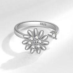 Color: White gold color Size: Adjustable Opening Fashion Element: Flowers Style: Europe and America Being Positive, Beautiful Meaning, Flower Rings, Spinning Ring, Spinning Rings, Simple Flower, Simple Flowers, Spinner Ring, Rings For Girls