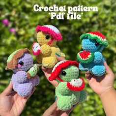 four crocheted stuffed animals are in the palm of someone's left hand