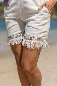 The Nala Shorts seamlessly blend comfort and bohemian style. Crafted from 100% cotton and natural fibers, these shorts feature a unique tribal blockprint, adding an artisanal touch to your wardrobe. The hand-made design exudes a free-spirited charm, capturing the essence of festival fashion. Embrace the carefree vibes with frayed edges, giving these shorts an effortlessly stylish and relaxed look. Whether you're dancing under the festival lights or exploring a bohemian paradise, these shorts are Bohemian Bottoms With Built-in Shorts For Vacation, Summer Beach Boho Print Bottoms, Bohemian Style Short Bottoms For Beach Season, Bohemian Short Bottoms For Beach Season, Bohemian Short Bottoms For Beach, Bohemian Beach Bottoms Short Length, Bohemian Short-length Bottoms For Beach, Bohemian Short Beach Bottoms, Bohemian Short Length Bottoms For Beach