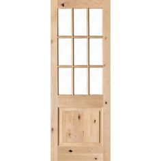 an unfinished wooden door with glass panels