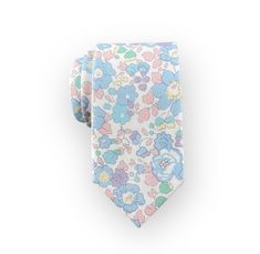 "Infuse a touch of whimsy into wedding aesthetics with this handmade cotton necktie adorned in a playful floral print. It's the perfect accessory for the groom and groomsmen in your Spring wedding. Pair it with a range of lightweight suits for a polished look in a classic-style wedding or let it add a pop of color to more relaxed, outdoor ceremonies. This tie isn't just great for weddings. It's an ideal choice for parties, proms, a romantic date and other special occasions - an excellent gift fo Elegant Cotton Ties For Spring, Cotton Ties For Weddings, Fitted Cotton Ties For Wedding, White Cotton Ties For Gifts, White Cotton Ties For Formal Occasions, Elegant Cotton Ties For Gifts, Cotton Wedding Tie, Cotton Wedding Ties, Summer Wedding Cotton Ties