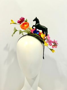 "Horse Fascinator- Day at the Races- Racing Headpiece - Mad Hatter- Kentucky Derby- Racing Fashion Hi,    This piece has a beautiful collection of flowers on a faux green moss is about 4\" wide. The black plastic horse is about 3\" high and 4\" long .  It's placed on the top of a skinny  1/4 \" satin covered headband that fits any adult head size.    -------------------------------------- If you like this try bigger version:  https://doramarra.etsy.com/listing/514762174 ------------------------- Black Mini Hats For Spring Garden Party, Spring Multicolor Headpieces For Garden Party, Multicolor Headpieces For Spring Garden Party, Spring Garden Party Multicolor Headpieces, Spring Racing Headpieces With Pinched Crown, Spring Races Headpieces With Pinched Crown, Spring Races Headpiece With Pinched Crown, Spring Races Headpiece With Structured Crown, Derby Hat Diy