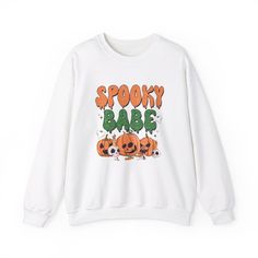 Soft and also spooky! Ideal for any situation, a unisex heavy blend crewneck sweatshirt is pure comfort. These garments are made from polyester and cotton. This combination helps designs come out looking fresh and beautiful. The collar is ribbed knit, so it retains its shape even after washing. There are no itchy side seams on these sweaters.  .: Made with a medium-heavy fabric blend of 50% cotton and 50% polyester (8.0 oz/yd² (271.25 g/m this sweatshirt feels cozy and is the perfect choice for Halloween Letter Print Sweatshirt For Streetwear, Halloween Streetwear Sweatshirt With Letter Print, Trendy Graphic Print Halloween Hoodie, Fall Cartoon Print Sweatshirt For Streetwear, Fall Cartoon Print Streetwear Sweatshirt, Fall Streetwear Sweatshirt With Cartoon Print, Cute Sweater For Fall Streetwear, Funny Streetwear Sweatshirt For Fall, Trendy Fall Sweater With Screen Print