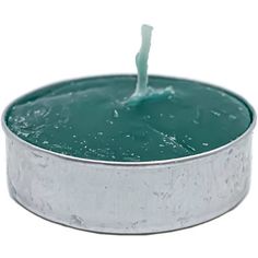 a candle that is inside of a tin