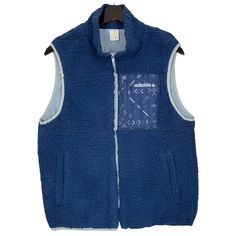 Adidas NEO Fleece Vest Jacket Outdoor Hiking Sportswear Blue Color Size Medium * Made in : China * Size on Tag : L * Manual Measurement (inch) : Chest 20, Length 25, Shoulder 15.5, Hem 17. * Recommended for Size : Medium (M) * Color : Blue * Condition : Used * See photos for details. * Free Defect : No Stain, No Holes, No Tears, No Faded. 95 Hooded Sports Vest, Winter Outdoor Activewear With Pockets, Casual Winter Activewear With Pockets, Blue Functional Track Jacket For Winter, Blue Functional Winter Track Jacket, Blue Crew Neck Activewear For Outdoor Activities, Casual Crew Neck Sports Outerwear, Casual Crew Neck Outerwear For Outdoor, Sportswear Fleece-lined Winter Track Jacket