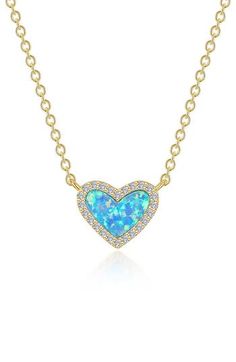 Bring a little sparkle and lustrous romance to any ensemble with this simulated opal heart pendant necklace traced in pavé simulated diamonds. 20" length; 3/8" pendant drop Sterling silver/18k-gold plate/simulated opal/simulated diamond Imported >Diamond Guide Elegant Blue Heart Necklace, Elegant Blue Jewelry With Heart Charm, Elegant Blue Heart Necklace With Birthstone, Elegant Blue Necklaces For Valentine's Day, Elegant Blue Heart Necklace For Valentine's Day, Elegant Blue Birthstone Heart Necklace, Blue Heart Pendant Necklace With Diamond Accents, Fine Jewelry Blue Heart Necklace, Blue Heart-shaped Fine Jewelry Necklace